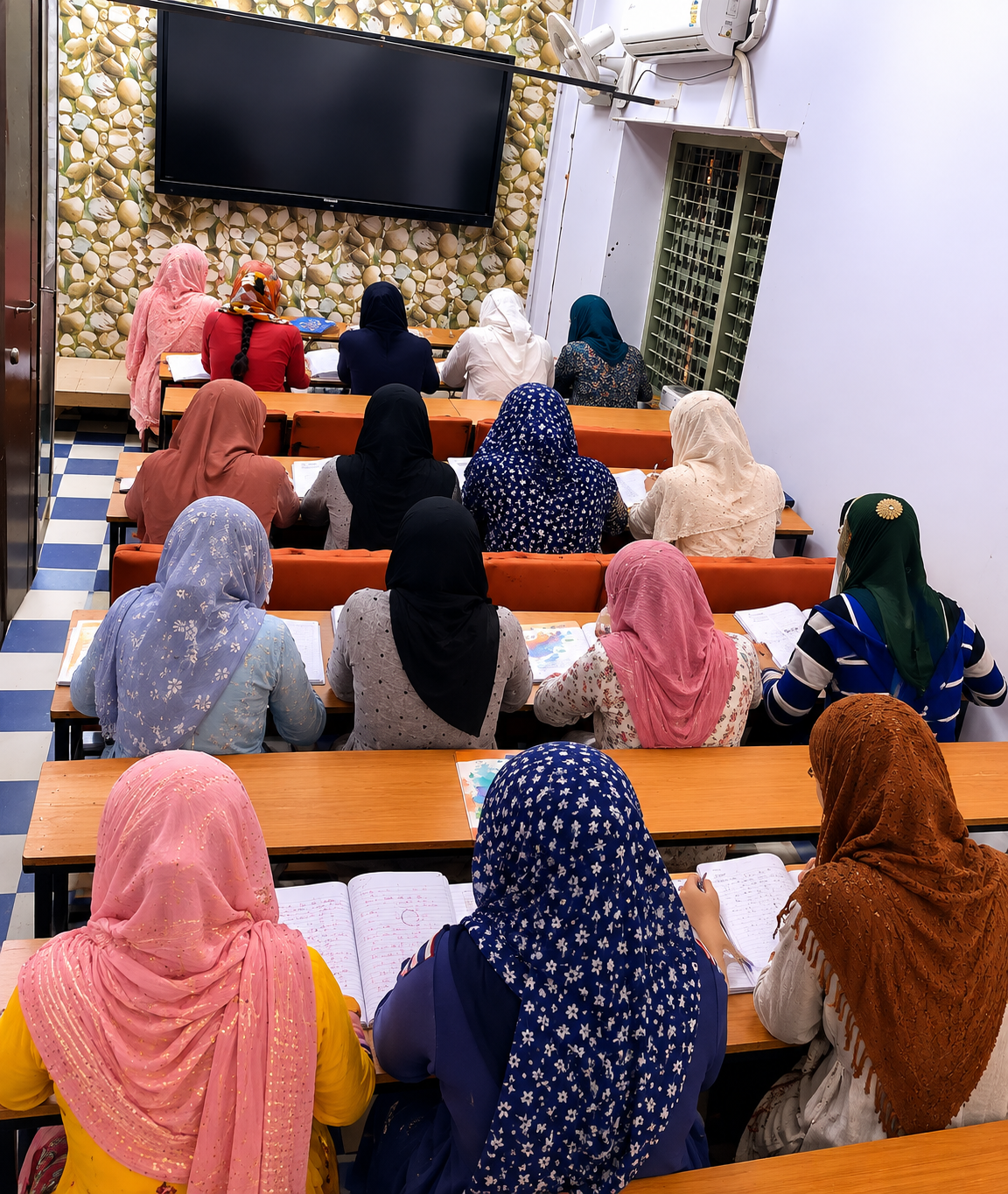Students attending classes in a residential NEET coaching environment